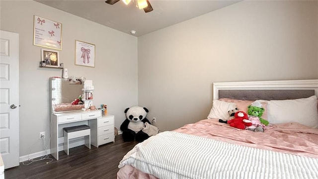 bedroom with baseboards, dark wood-style flooring, and ceiling fan