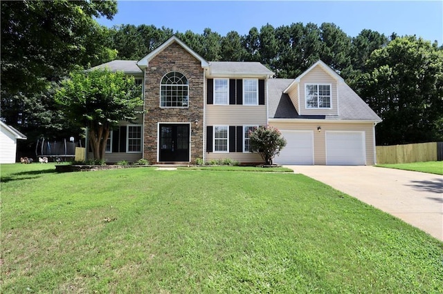 843 Kendall Park Dr, Winder, GA 30680 - view of front of home featuring concrete driveway, stone siding, and a garage