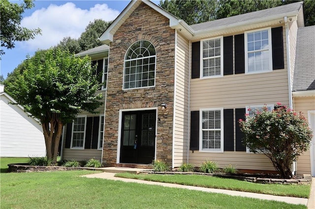 843 Kendall Park Dr, Winder, GA 30680 - view of front of home with stone siding and a front yard