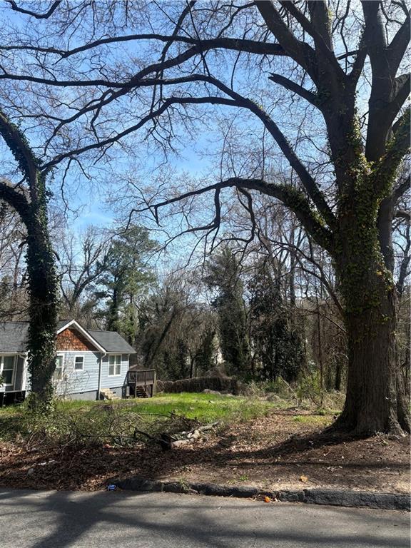 419 Lanier St NW, Atlanta, GA 30318 - exterior space featuring aphalt driveway