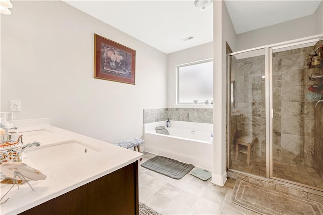 bathroom featuring vanity and plus walk in shower