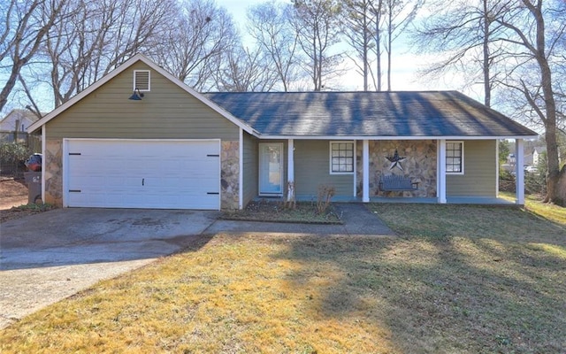 single story home featuring a garage, covered porch, and a front yard