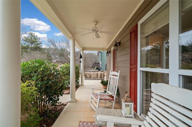 view of patio featuring covered porch and ceiling fan