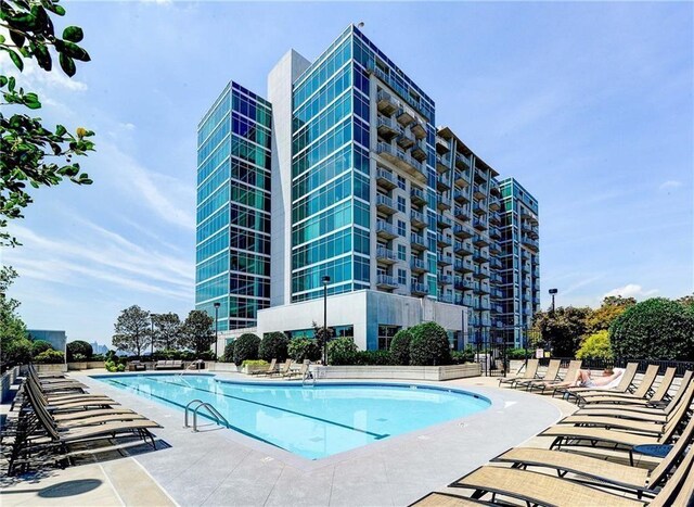 community pool featuring a patio
