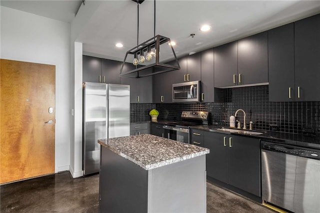 kitchen featuring stainless steel appliances, a sink, finished concrete floors, a center island, and dark stone counters