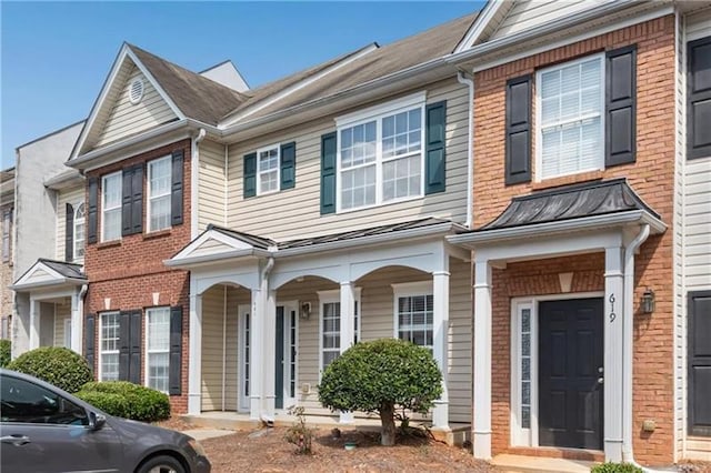 621 Kenridge Way Unit 0, Suwanee, GA 30024 - view of property with brick siding