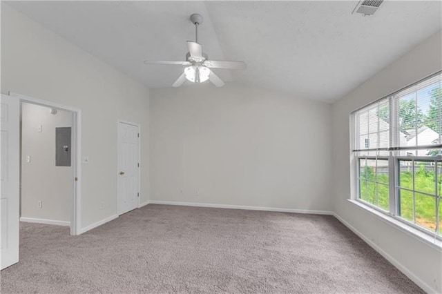 621 Kenridge Way Unit 0, Suwanee, GA 30024 - empty room with carpet, vaulted ceiling, a ceiling fan, baseboards, and electric panel