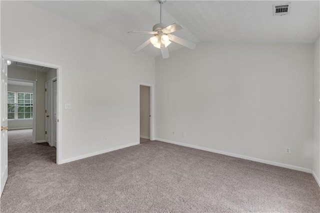 621 Kenridge Way Unit 0, Suwanee, GA 30024 - empty room with carpet floors, ceiling fan, attic access, and lofted ceiling