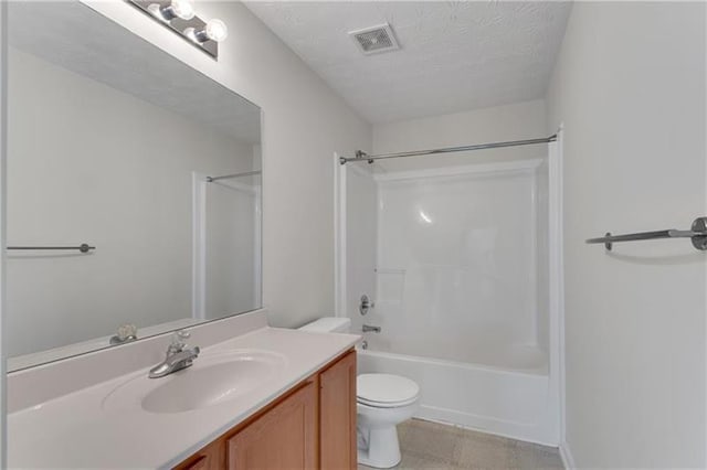 621 Kenridge Way Unit 0, Suwanee, GA 30024 - bathroom with toilet, vanity, washtub / shower combination, and a textured ceiling