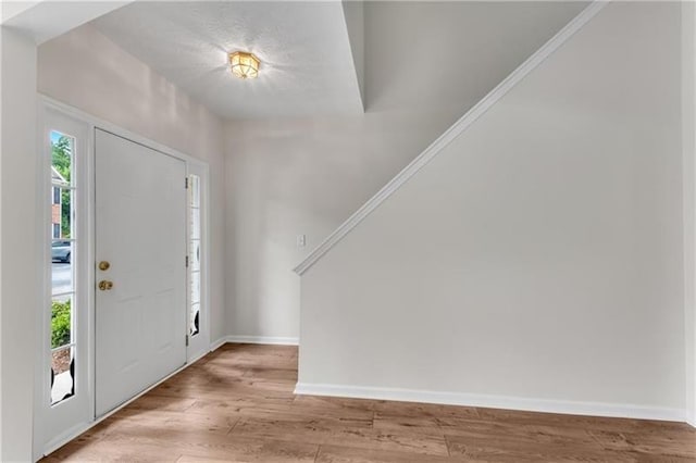 621 Kenridge Way Unit 0, Suwanee, GA 30024 - foyer featuring baseboards and light wood finished floors