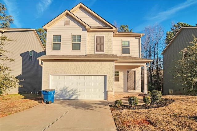 view of front of home with a garage