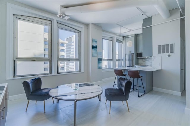 interior space featuring visible vents and baseboards