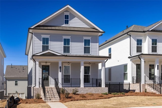 171 Basil St, Cumming, GA 30040 - view of front facade with covered porch, a standing seam roof, metal roof, and stairs