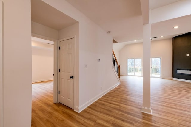 corridor featuring light hardwood / wood-style floors