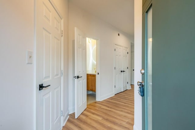 hallway featuring light hardwood / wood-style floors