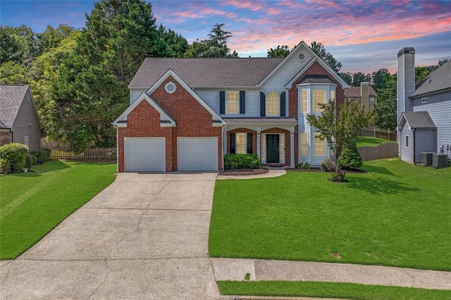 view of front of property featuring brick siding, concrete driveway, and a garage