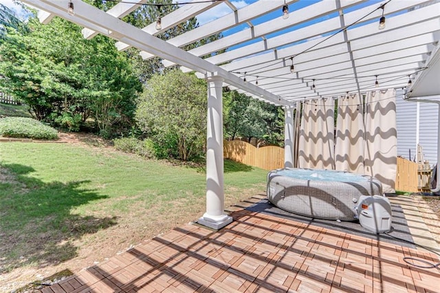 deck featuring a pergola and a patio