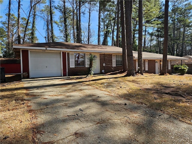 single story home with a garage