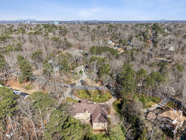 drone / aerial view with a view of trees