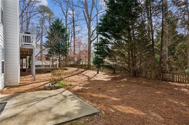 view of yard with a patio area and a fenced backyard