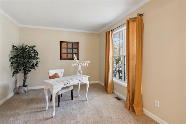 home office with ornamental molding, light carpet, visible vents, and baseboards