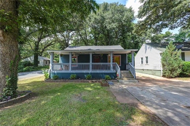 view of front of home with a front lawn and covered porch