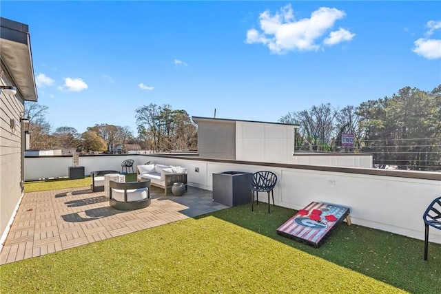 view of patio featuring an outdoor living space and fence