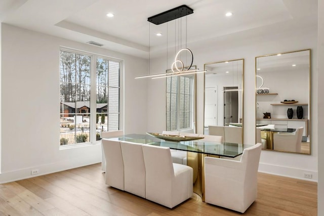 185 Pebble Trl, Alpharetta, GA 30009 - dining room with a tray ceiling, light wood-type flooring, recessed lighting, and baseboards