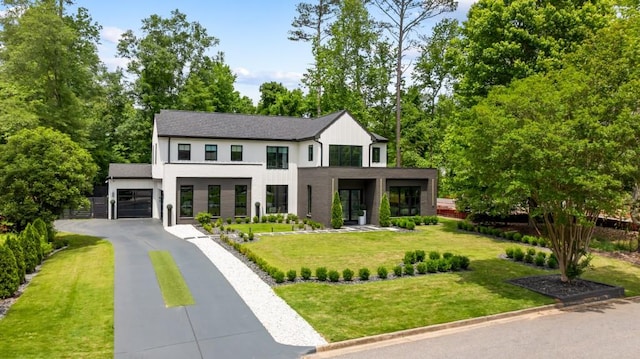185 Pebble Trl, Alpharetta, GA 30009 - view of front of home featuring driveway, a front yard, and a garage