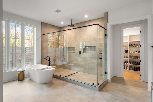 185 Pebble Trl, Alpharetta, GA 30009 - full bath with a shower stall, a freestanding tub, recessed lighting, and tile patterned floors
