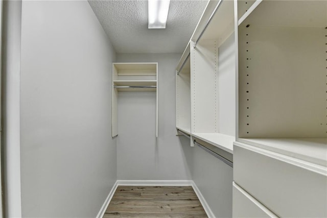 3650 Ashford Dunwoody Rd NE Unit 923, Atlanta, GA 30319 - spacious closet with wood finished floors