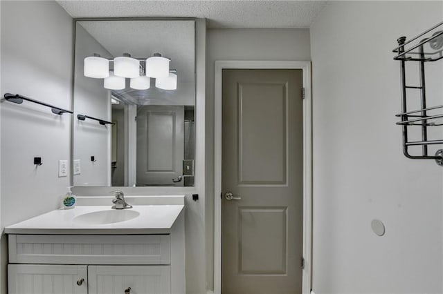 3650 Ashford Dunwoody Rd NE Unit 923, Atlanta, GA 30319 - bathroom featuring vanity and a textured ceiling