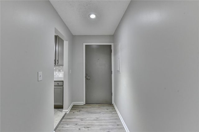 3650 Ashford Dunwoody Rd NE Unit 923, Atlanta, GA 30319 - hallway featuring baseboards and light wood-style floors