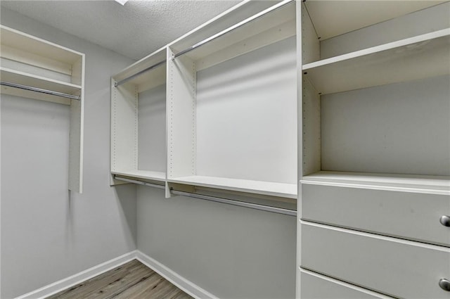 3650 Ashford Dunwoody Rd NE Unit 923, Atlanta, GA 30319 - spacious closet featuring wood finished floors