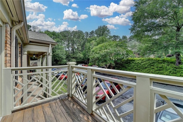 3650 Ashford Dunwoody Rd NE Unit 923, Atlanta, GA 30319 - wooden terrace with view of scattered trees