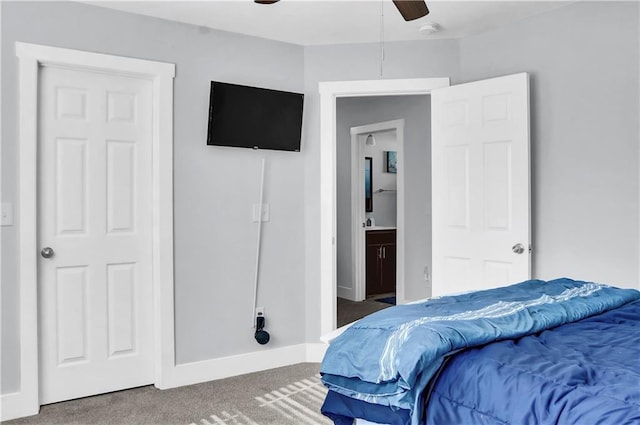 bedroom featuring carpet flooring, connected bathroom, and ceiling fan