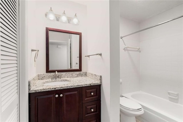 full bathroom with vanity, shower / bathtub combination, and toilet