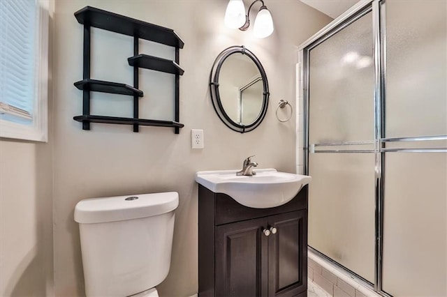 5666 Goldfield Dr, Acworth, GA 30102 - bathroom featuring a stall shower, vanity, and toilet