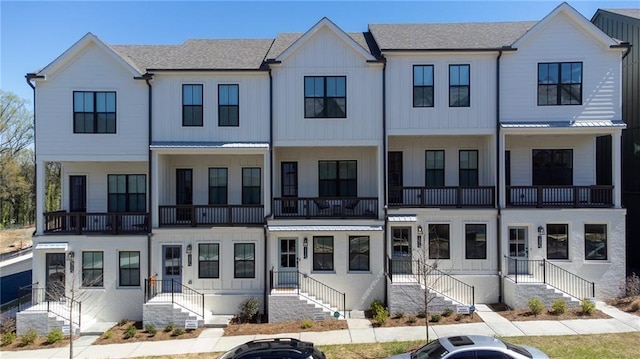 1408 Cozy Ct Unit 303, Atlanta, GA 30315 - view of property with metal roof, a shingled roof, and a standing seam roof