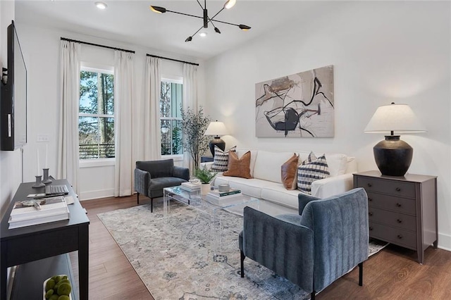 1408 Cozy Ct Unit 303, Atlanta, GA 30315 - living area featuring recessed lighting, wood finished floors, baseboards, and a chandelier