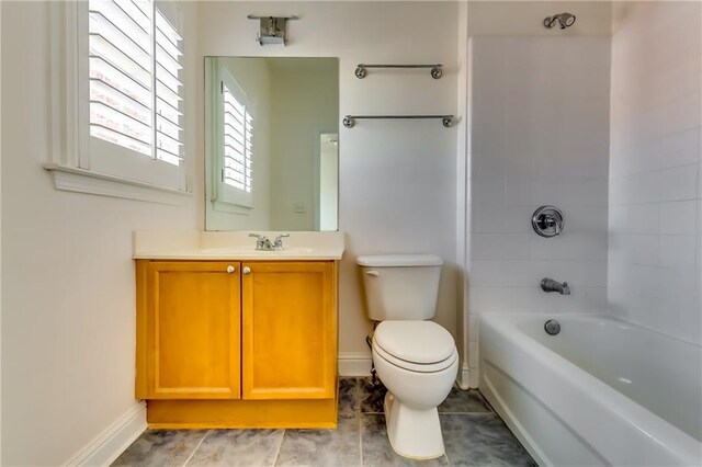 full bathroom with tile patterned flooring, vanity, toilet, and shower / bath combination