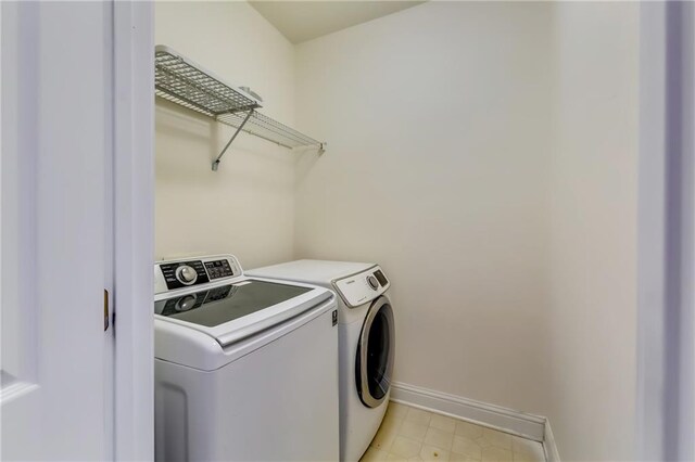 washroom featuring separate washer and dryer