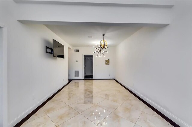 interior space with a notable chandelier