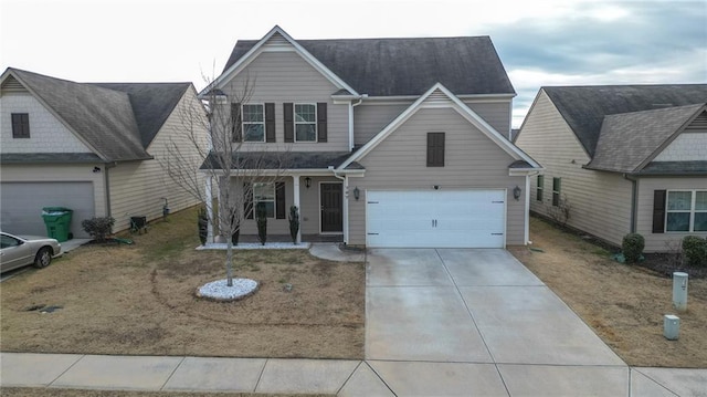 view of front of property with a garage