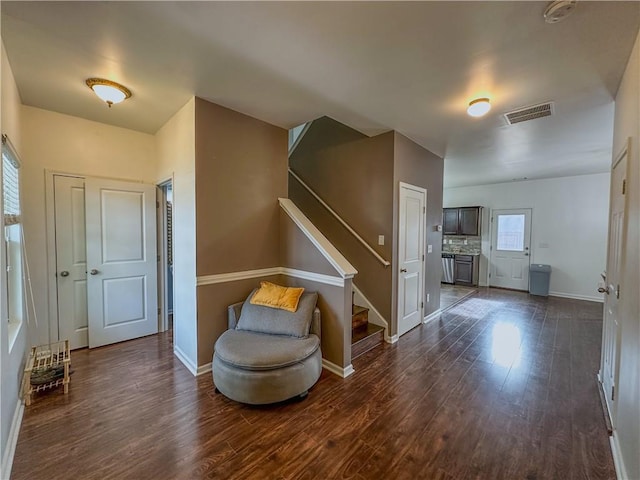 living area featuring dark hardwood / wood-style floors