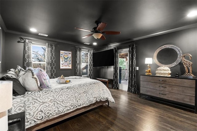 bedroom featuring ceiling fan, ornamental molding, dark hardwood / wood-style floors, and access to exterior