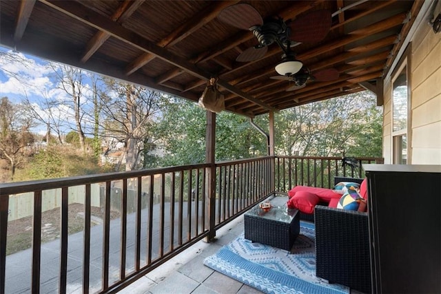 balcony featuring ceiling fan