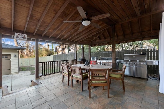 view of patio featuring grilling area and ceiling fan