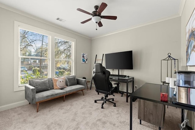 office area with light carpet, ceiling fan, and crown molding