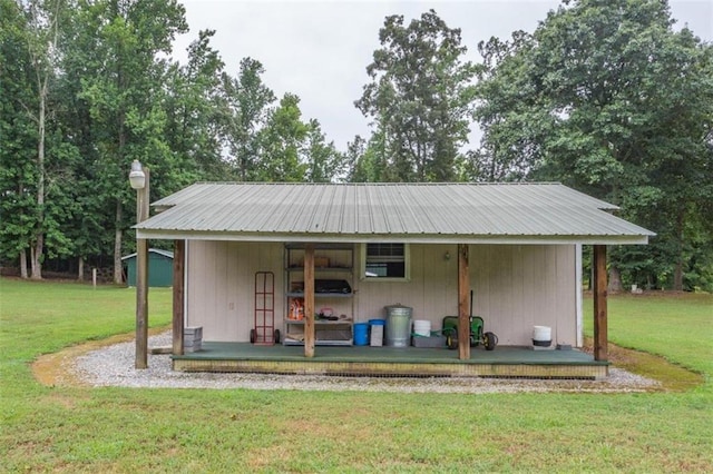 view of outdoor structure with a yard